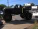 1991 Ford Bronco - This lifted pickup truck does not appear to be a 1991 Ford Bronco.