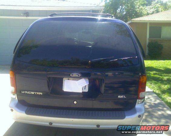 Rear view of a 2000 Ford Windstar van parked in a driveway