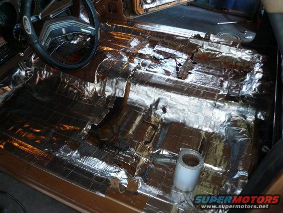 Interior of a 1975 Ford Ranchero with sound deadening material on the floor