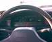 1991 Mazda MX-6 - The interior dashboard of a car is shown, a digital odometer displaying zero miles.