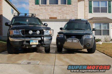 2006 Ford Escape front view with aftermarket bull bar and roof rack