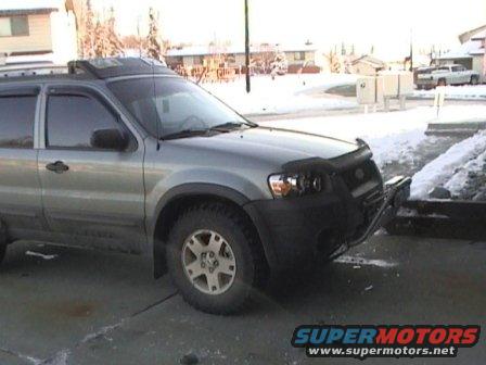 2006 Ford Escape with aftermarket grille guard and bug deflector