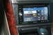 2003 Acura TL - Aftermarket Pioneer stereo installed in a car's dashboard, displaying XM radio information.