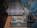 1995 Ford Bronco - Close-up of a belt sander, a shop tool, with a worn sanding belt.