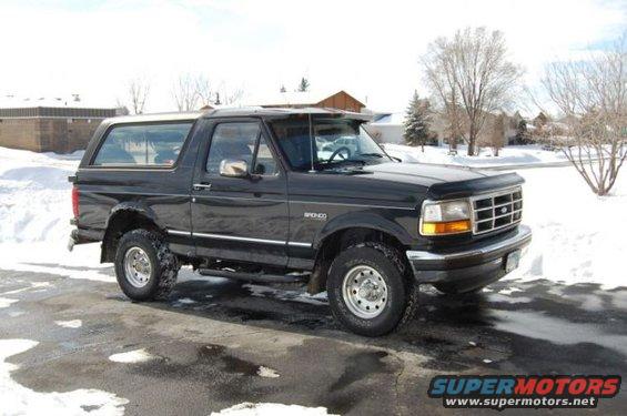 Black 1994 Ford Bronco in snow