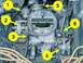 1978 Ford Bronco - A detailed view of a vehicle's carburetor and surrounding engine components, marked with numbered indicators.
