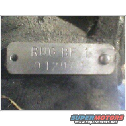 Metal tag stamped RUG BF 1 012970