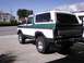 1978 Ford Bronco - Rear view of a two-tone green and white 1978 Ford Bronco.