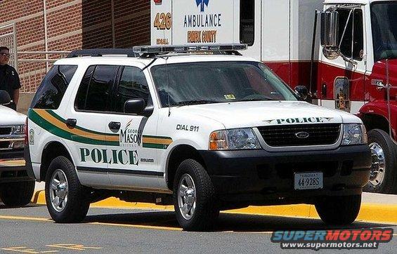 George Mason University police SUV parked next to an ambulance and fire truck