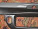 2004 Ford Crown Victoria - Dashboard trim piece with textured black and smooth silver finishes.