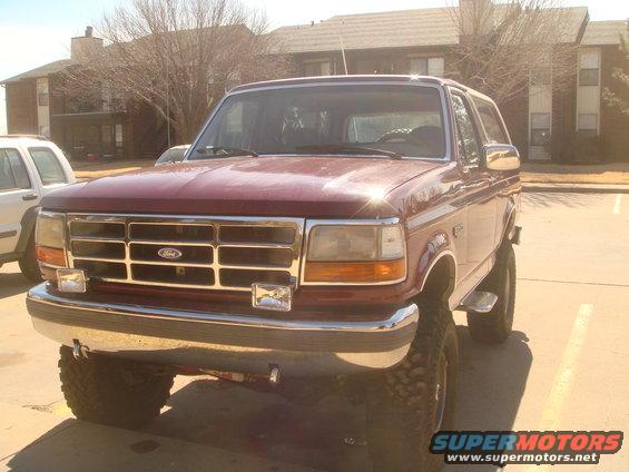 Red 1992 Ford Bronco front grille and headlights