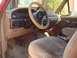 1992 Ford Bronco - Interior view of a 1992 Ford Bronco, showing the dashboard, steering wheel, and seats.