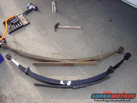 The old leaf spring and the new Procomp 6" leaf spring.  Notice the old pack has a broken leaf.