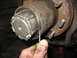 1995 Ford C-350 (Centurion Conversions) - Front wheel hub assembly detail, likely during a rebuild or maintenance procedure.