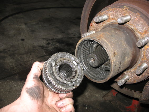 Front axle hub assembly with manual locking mechanism removed