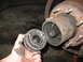 1995 Ford C-350 (Centurion Conversions) - Close-up of a front axle hub assembly with the manual locking mechanism removed, revealing the splined shaft.