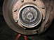 1995 Ford C-350 (Centurion Conversions) - Close-up view of a front axle hub assembly, highlighting the internal splines and rotor.