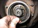 1995 Ford C-350 (Centurion Conversions) - Front axle hub assembly showing internal splines, likely needing service.
