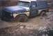 1978 Ford Bronco - This 1978 Ford Bronco is stuck in deep mud, with its front wheel submerged.