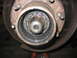 1995 Ford C-350 (Centurion Conversions) - Close-up view of a front axle hub assembly, showing internal splines and the locking mechanism.