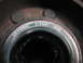 1995 Ford C-350 (Centurion Conversions) - A close-up view of a National brand wheel bearing, marked with its part number and country of origin.