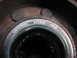1995 Ford C-350 (Centurion Conversions) - Close-up of a wheel bearing showing manufacturer and part number.