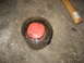 1995 Ford C-350 (Centurion Conversions) - Bearing assembly with red cap, likely for a vehicle's front axle rebuild.