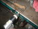1995 Ford C-350 (Centurion Conversions) - Wire brush on drill cleaning a rusty metal rod. Part of a front axle rebuild process.