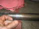 1995 Ford C-350 (Centurion Conversions) - Sanding an axle shaft to clean up a bearing surface.