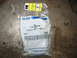 1995 Ford C-350 (Centurion Conversions) - A sealed Ford parts package containing a seal with part number 2C3Z-3254-AA.