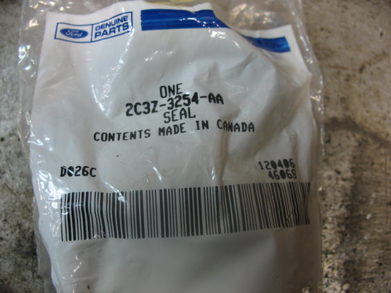 Ford Genuine Parts bag containing a seal, part number 2C3Z-3254-AA. Contents made in Canada