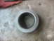 1995 Ford C-350 (Centurion Conversions) - A close-up view of a metal bearing part, likely for a vehicle's front axle rebuild.