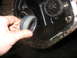 1995 Ford C-350 (Centurion Conversions) - A person is holding a seal near an open differential housing, revealing internal gears.