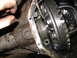 1995 Ford C-350 (Centurion Conversions) - Close-up view of differential gears with a visible part number, likely during a rebuild.