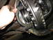 1995 Ford C-350 (Centurion Conversions) - Differential gears and axle housing being worked on, with a part number visible on the housing.