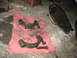 1995 Ford C-350 (Centurion Conversions) - Automotive parts are laid out on a rag, with a pan of fluid nearby, suggesting a repair or maintenance task.