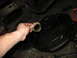 1995 Ford C-350 (Centurion Conversions) - Draining old fluid from a vehicle's differential housing into a catch pan.