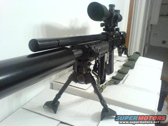 sniper rifle with scope, bipod, and sling