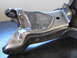1996 Ford Bronco - Close-up of a metal suspension component with extensive welding.