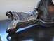 1996 Ford Bronco - This image shows a close-up view of a modified front suspension part, highlighting the welding work.
