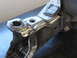 1996 Ford Bronco - Heavily welded suspension part shown in detail, likely a custom or repaired component.