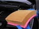 2002 BMW M3 - Close-up of a BMW air filter, part number 13721730916, being held for inspection.