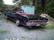 1969 Mercury Marquis - This 1969 Mercury Marquis convertible features a black exterior, red interior, and distinctive rear styling.
