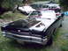 1969 Mercury Marquis - Black 1969 Mercury Marquis convertible with a prominent grille and chrome bumper.