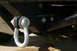 1986 Ford Bronco - A heavy-duty tow hook is mounted to the vehicle's chassis, ready for towing or recovery operations.