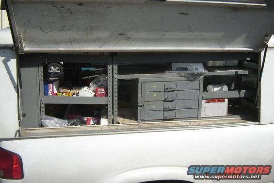 Truck bed storage with shelves and drawers