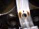 1974 Ford F-100 - This image shows a close-up view of an engine component, likely a bearing or part of the valvetrain, with visible oil staining.