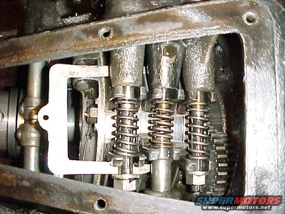 mvc115f.jpg Brake band clamped so shaft can be removed / installed.