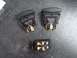 1996 Ford Bronco - Close-up view of three black automotive rocker switches on a dark textured surface.