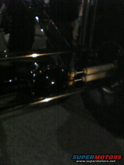 Close-up of vehicle shock absorbers and suspension arms